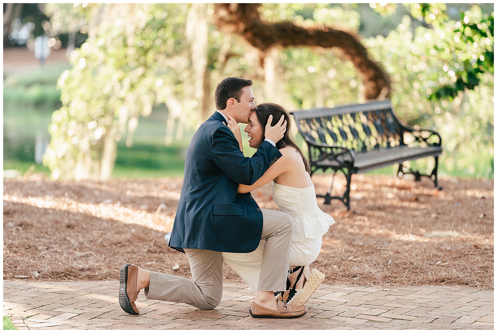 groom proposing on one knee